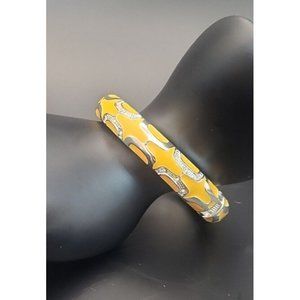 Unbranded Yellow Bracelet with a Gold-Tone Overlay and Clear Rhinestones Hinged